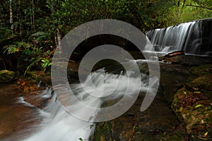 Cascading waterfall through Australian bush land