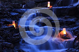 Cascading Waterfall Garden with Candles