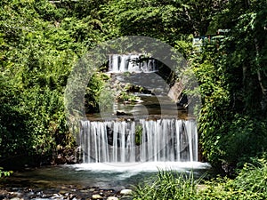 Cascading waterfall in the Suzu River near the Oyama Cable Car to Afuri Shrine, Isehara, Japan