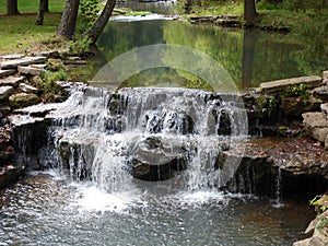 A cascading waterfall on a woodland stream in the Ozarks