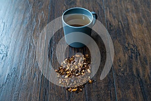 Cascara or Coffee Cherry Tea in Cup. Sun-Dried Peeled Coffee Beans photo