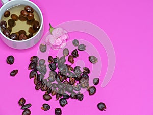 cascara tea, dried cherry coffee, and a carnation photo
