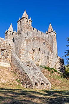 Casemate bunker emerging from the walls and the keep of Castelo da Feira Castle