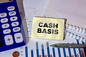 Cash Basis is shown using a text and photo of calculator