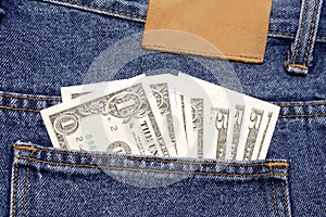 Cash in denim jeans pocket