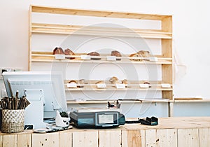 Cash desk in plastic free store. Zero waste shop interior details