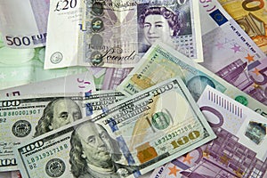 Cash from different countries on the table