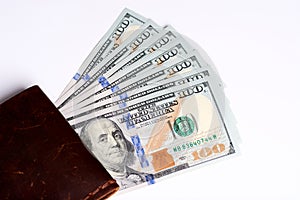 Cash of dollar note, dollar background. Lot of one hundred dollar bills close-up. dollars in wallet on white background