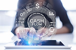 Cash flow button on virtual screen. Business Tehcnology concept. photo