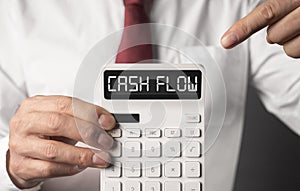 Cash flow word on calculator, cashflow inscription