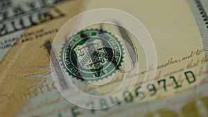 Cash money background. Benjamin Franklin portrait on 100 US dollar bill close up, the image is rotated