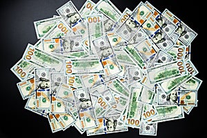 Cash money banknotes wallapper. US dollars close up. American one hundred dollars. USD paper cash. Concept of finance