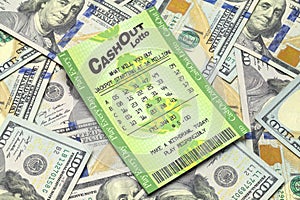 Cash Pile and Lottery Ticket photo