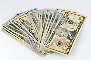 Cash pile money fanned white background