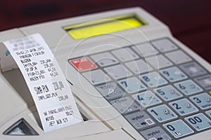 Cash register with cash register receipt