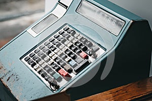 cash register on a dark wooden background