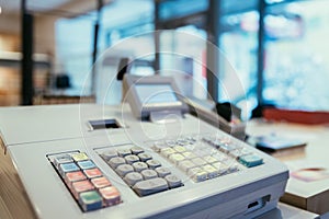 Cash register in a store, sales; Blurry Background photo