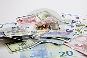 Cash on table : dollars, euro, rubl broken money. All in mess, global crisis concept