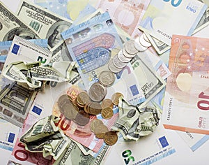 Cash on table isolated: dollars, euro, rubl broken money. All in mess, global crisis concept