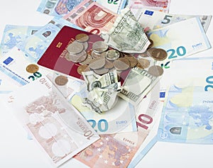 Cash on table isolated: dollars, euro, rubl broken money. All in mess, global crisis . passport travel concept