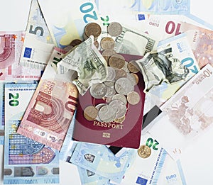 Cash on table isolated: dollars, euro, rubl broken money. All in mess, global crisis . passport travel concept