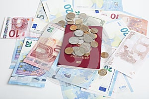 Cash on table isolated: dollars, euro, rubl broken money. All in mess, global crisis . passport travel concept