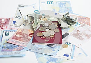 Cash on table isolated: dollars, euro, rubl broken money. All in mess, global crisis . passport travel concept