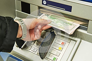 Dollar cash withdrawal from ATM photo