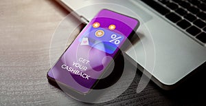 Cashback customer loyalty program concept. Smartphone with discount card with rewarding marketing points on the screen