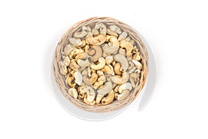 Cashew nuts in a basket bowl. Top view