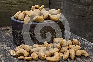 Cashew nuts and ceramic bowl
