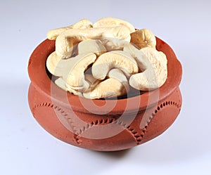 Cashew nuts in a clay bowl