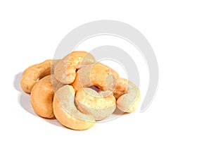 Cashew nuts against a white background