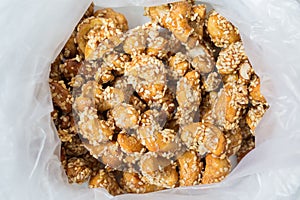 Cashew nuts glazed sugar with sesame
