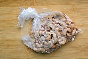 Cashew nuts in a plastic bag.