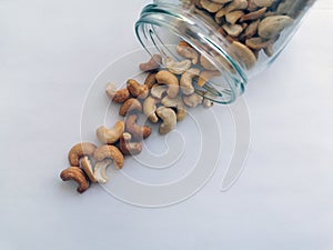 Cashew on white table closeup background photo