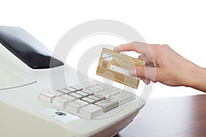 Cashier Holding Credit Card in Cash Register