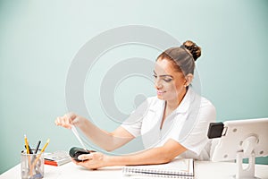 Cashier printing payment receipt at a spa