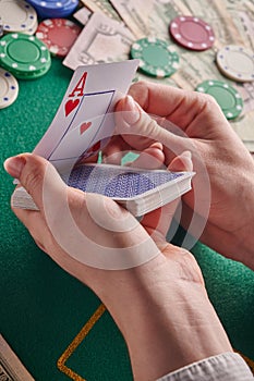 Casino background, cards and ace of dollars and poker chips. Gaming business, success