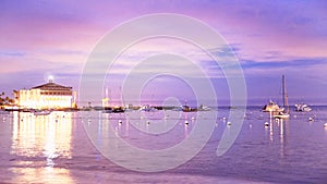 Casino at Catalina Island Offset with Ships in Bay at Sunset with purple skies