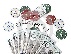 Casino chips and cards and one hundred dollars on a white background