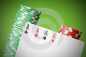 Casino chips and four aces