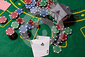 Casino chips with toy house - housing market gamble concept