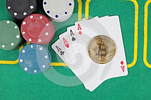 Casino chips winning combination four aces, golden bitcoin