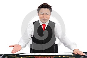 Casino dealer in vest and tie