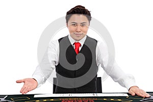 Casino dealer in vest and tie photo