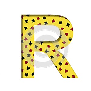 Casino font. The letter R cut out of paper on the yellow background of the pattern of card suits spades hearts diamonds and clubs