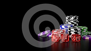 Casino gambling chips and dice on black background.