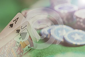 Casino, gambling concept. Blackjack and poker chips on green felt