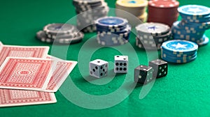 Casino, gambling. Poker chips piles, playing cards and dice on green felt background